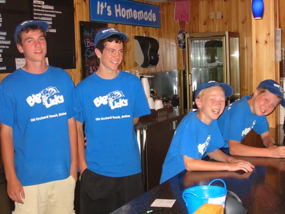 The boys at the counter in Big Licks caps and tees